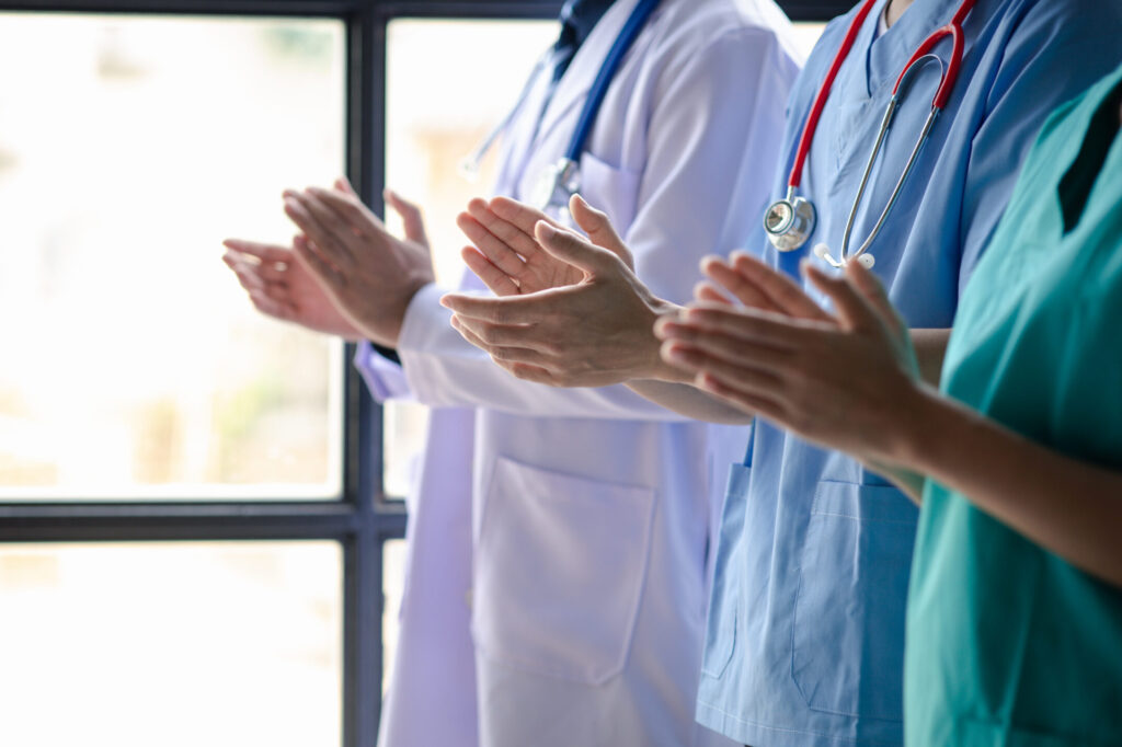 meeting room in the hospital, a group of doctors attended a stan